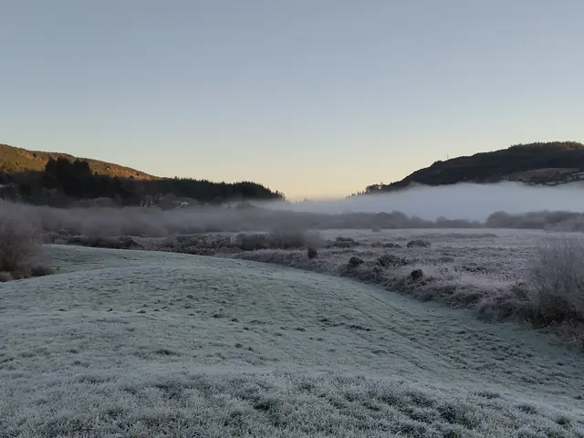 Early-morning mist over the eastern lake